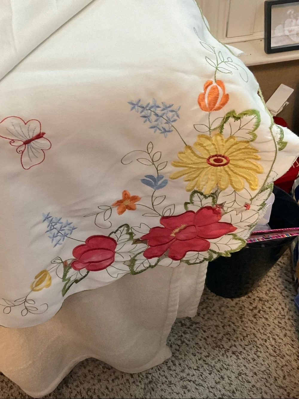 White Embroidered Floral Tablecloth with Red, Yellow & Pink Accents